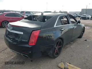 2014 Cadillac CTS AWD z VIN 1G6AW5SX6E0197020, wystawiony jako IAAI lot #41228636 z przebiegiem Nie podano mil oraz . Historia ofert i sprzedaży dostępna na DreamBid. Obrazek 4.