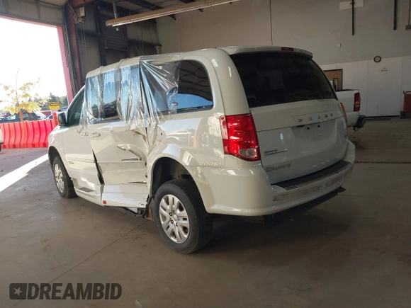 2017 Dodge Grand Caravan SE z VIN 2C4RDGBG6HR848612, wystawiony jako IAAI lot #38453498 z przebiegiem 56 964 mil mil oraz . Historia ofert i sprzedaży dostępna na DreamBid. Obrazek 3.