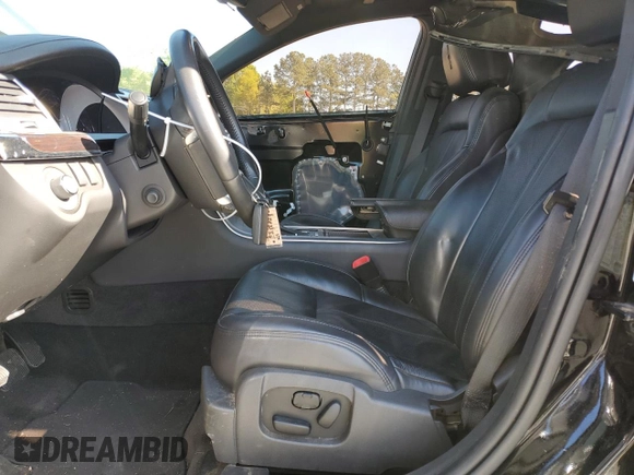 2011 Lincoln MKS with VIN 1LNHL9DR7BG615397, listed as a Copart auction lot 52047015 with 111,720 mi miles and Salvage Title. Bid and sale history available at DreamBid. Image 7.