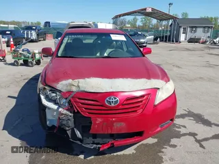 2007 Toyota Camry CE with VIN JTNBE46K073031988, listed as a IAAI auction lot 42062321 with 238,925 mi miles. Bid and sale history available at carsss.com. Image 13.