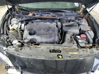 2019 Nissan Maxima S z VIN 1N4AA6AV8KC370778, wystawiony jako Copart lot #81154124 z przebiegiem 143 455 mil mil oraz Szkoda całkowita • Salvage title. Historia ofert i sprzedaży dostępna na DreamBid. Obrazek 11.