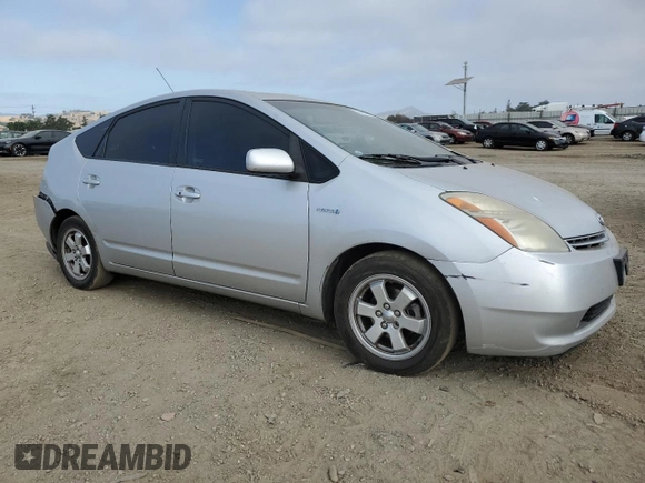 2006 Toyota Prius z VIN JTDKB20U167071838, wystawiony jako Copart lot #59407885 z przebiegiem 234 172 mil mil oraz Szkoda całkowita • Salvage title. Historia ofert i sprzedaży dostępna na DreamBid. Obrazek 4.