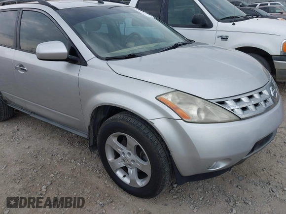 2003 Nissan Murano SE z VIN JN8AZ08TX3W103022, wystawiony jako IAAI lot #42216357 z przebiegiem 208 838 mil mil oraz . Historia ofert i sprzedaży dostępna na DreamBid. Obrazek 12.