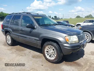 2002 Jeep Grand Cherokee Limited with VIN 1J4GW58J02C163931, listed as a IAAI auction lot 42632552 with 228,955 mi miles and . Bid and sale history available at DreamBid. Image 1.