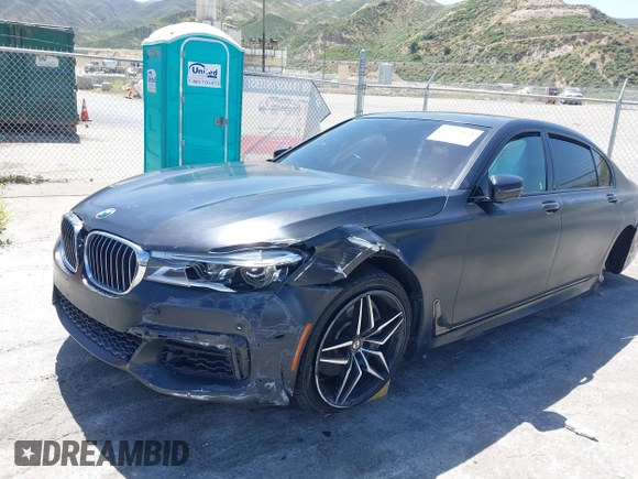 2018 BMW 7 Series 750i with VIN WBA7F0C51JGM23504, listed as a IAAI auction lot 39379378 with 82,251 mi miles. Bid and sale history available at carsss.com. Image 19.