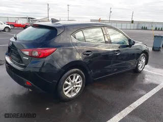 2016 Mazda Mazda3 i Grand Touring with VIN JM1BM1N74G1279692, listed as a IAAI auction lot 41164751 with 93,535 mi miles. Bid and sale history available at carsss.com. Image 4.
