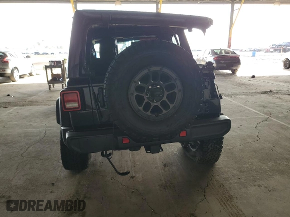 2023 Jeep Wrangler Sport S with VIN 1C4HJXDG0PW668162, listed as a Copart auction lot 45942865 with 62,944 mi miles and Salvage Title. Bid and sale history available at DreamBid. Image 6.