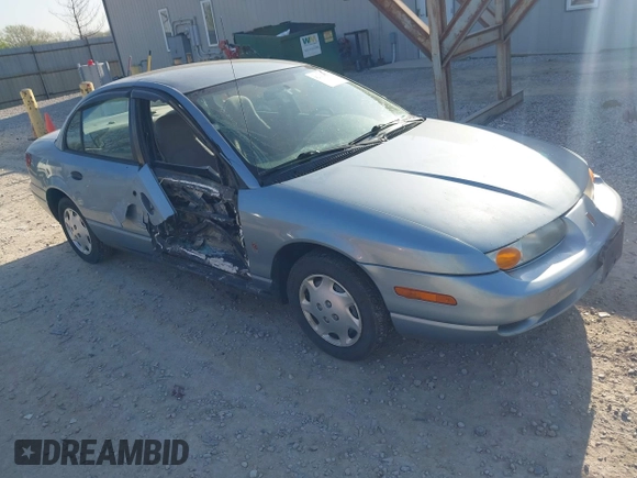 2001 Saturn SL z VIN 1G8ZH528X1Z330896, wystawiony jako IAAI lot #42104170 z przebiegiem 136 290 mil mil oraz . Historia ofert i sprzedaży dostępna na DreamBid. Obrazek 1.