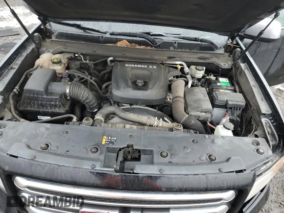 2016 GMC Canyon z VIN 1GTP6CE17G1380605, wystawiony jako Copart lot #88750975 z przebiegiem 102 571 mil mil oraz Szkoda całkowita • Salvage title. Historia ofert i sprzedaży dostępna na DreamBid. Obrazek 11.