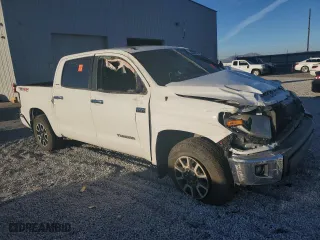 2019 Toyota Tundra 4WD SR5 with VIN 5TFHY5F19KX786075, listed as a Copart auction lot 82649434 with 0 mi miles and Salvage Title. Bid and sale history available at carsss.com. Image 4.