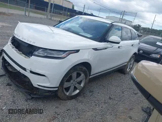 2020 Land Rover Range Rover Velar S z VIN SALYB2EX2LA256971, wystawiony jako IAAI lot #42525724 z przebiegiem 76 802 mil mil oraz . Historia ofert i sprzedaży dostępna na DreamBid. Obrazek 2.
