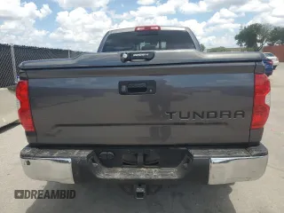 2019 Toyota Tundra SR with VIN 5TFRM5F13KX141745, listed as a Copart auction lot 56910955 with 67,856 mi miles and Salvage title. Bid and sale history available at DreamBid. Image 6.