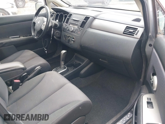 2009 Nissan Versa S with VIN 3N1BC13E59L407294, listed as a IAAI auction lot 41692951 with 250,029 mi miles and . Bid and sale history available at DreamBid. Image 5.