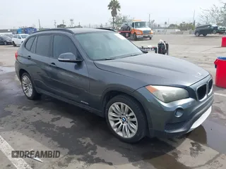2013 BMW X1 28i with VIN WBAVM1C55DVW41609, listed as a IAAI auction lot 41604038 with 126,036 mi miles. Bid and sale history available at carsss.com. Image 1.