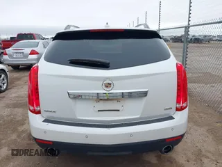 2016 Cadillac SRX Luxury Collection z VIN 3GYFNBE36GS519495, wystawiony jako IAAI lot #42147882 z przebiegiem 126 689 mil mil oraz . Historia ofert i sprzedaży dostępna na DreamBid. Obrazek 16.