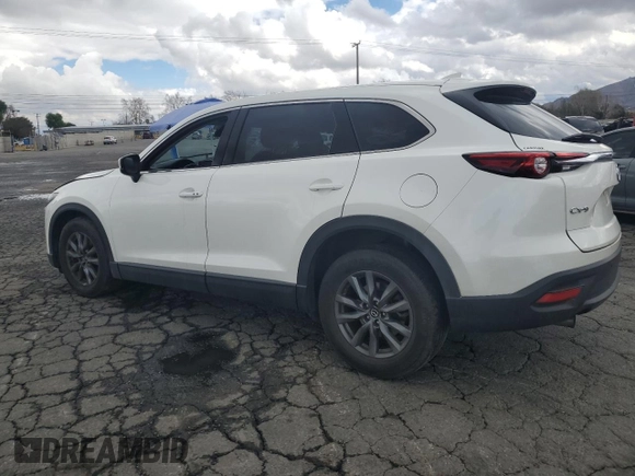2021 Mazda CX-9 Touring with VIN JM3TCACY5M0527069, listed as a Copart auction lot 43014655 with 66,989 mi miles and Salvage title. Bid and sale history available at DreamBid. Image 2.