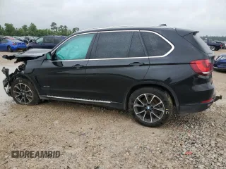 2014 BMW X5 xDrive35i z VIN 5UXKR0C59E0H23070, wystawiony jako Copart lot #55814815 z przebiegiem 113 895 mil mil oraz Szkody całkowita. Historia ofert i sprzedaży dostępna na DreamBid. Obrazek 2.
