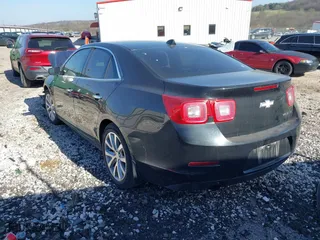 2013 Chevrolet Malibu LTZ with VIN 1G11H5SA6DF217077, listed as a IAAI auction lot 41779449 with 150,412 mi miles. Bid and sale history available at carsss.com. Image 3.