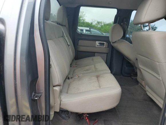 2010 Ford F-150 XL with VIN 1FTFW1EV1AFD48049, listed as a Copart auction lot 58571135 with 189,439 mi miles and Salvage title. Bid and sale history available at DreamBid. Image 10.