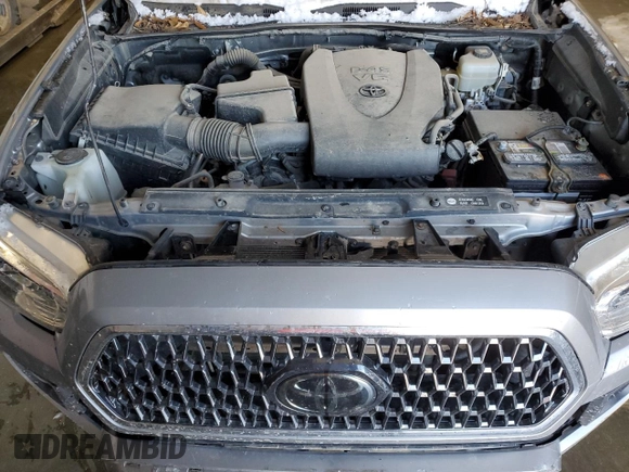 2018 Toyota Tacoma SR z VIN 3TMCZ5AN2JM122416, wystawiony jako Copart lot #41620015 z przebiegiem Nie podano mil oraz Szkoda całkowita • Salvage title. Historia ofert i sprzedaży dostępna na DreamBid. Obrazek 11.