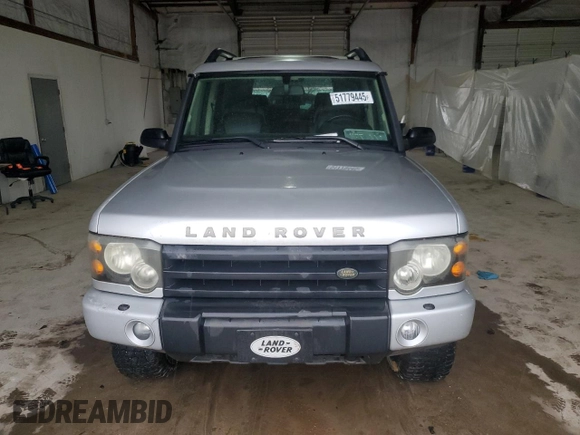2004 Land Rover Discovery SE z VIN SALTW19404A850159, wystawiony jako Copart lot #51779445 z przebiegiem 166 321 mil mil oraz Szkoda całkowita • Salvage title. Historia ofert i sprzedaży dostępna na DreamBid. Obrazek 5.