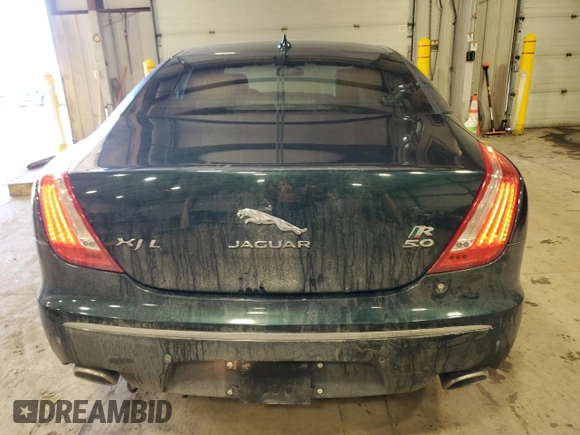 2014 Jaguar XJ with VIN SAJWA2GTXEMV72147, listed as a Copart auction lot 44854485 with 103,814 mi miles and Salvage Title. Bid and sale history available at DreamBid. Image 6.