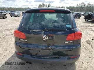 2012 Volkswagen Tiguan SE with VIN WVGAV7AX1CW610349, listed as a Copart auction lot 49250985 with 139,718 mi miles and Salvage Title. Bid and sale history available at DreamBid. Image 6.
