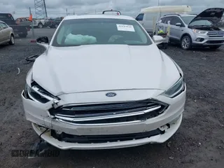 2017 Ford Fusion SE with VIN 3FA6P0H92HR178972, listed as a IAAI auction lot 42243949 with 157,544 mi miles and . Bid and sale history available at DreamBid. Image 12.