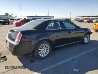 2012 Chrysler 300 with VIN 2C3CCAAG9CH201079, listed as a Copart auction lot 80343504 with 137,593 mi miles and Salvage Title. Bid and sale history available at DreamBid. Image 3.