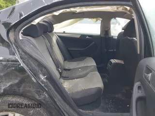 2017 Volkswagen Jetta S z VIN 3VW2B7AJ6HM345400, wystawiony jako IAAI lot #42297120 z przebiegiem 158 923 mil mil oraz . Historia ofert i sprzedaży dostępna na DreamBid. Obrazek 8.