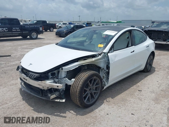 2023 Tesla Model 3 z VIN 5YJ3E1EA8PF384806, wystawiony jako IAAI lot #42526063 z przebiegiem 95 389 mil mil oraz . Historia ofert i sprzedaży dostępna na DreamBid. Obrazek 6.