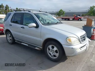 2003 Mercedes-Benz M-Class 3.7L with VIN 4JGAB57EX3A435535, listed as a IAAI auction lot 42099551 with 205,226 mi miles. Bid and sale history available at carsss.com. Image 1.