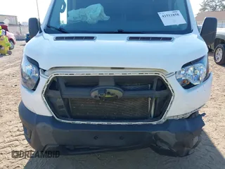 2020 Ford Transit Cargo with VIN 1FTBR1C80LKB70535, listed as a IAAI auction lot 41511858 with 76,085 mi miles and . Bid and sale history available at DreamBid. Image 17.
