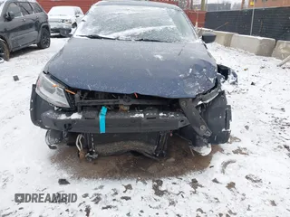 2014 Volkswagen Jetta S z VIN 3VW2K7AJXEM335027, wystawiony jako IAAI lot #41238282 z przebiegiem 157 568 mil mil oraz . Historia ofert i sprzedaży dostępna na DreamBid. Obrazek 13.