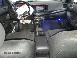 2015 Mitsubishi Lancer Evolution Final Edition z VIN JA32W7FV4FU028743, wystawiony jako Copart lot #75206334 z przebiegiem 51 409 mil mil oraz Szkody całkowita. Historia ofert i sprzedaży dostępna na DreamBid. Obrazek 8.