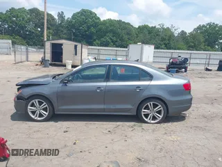 2014 Volkswagen Jetta SE with VIN 3VWD07AJ3EM232529, listed as a IAAI auction lot 42286442 with 125,000 mi miles and . Bid and sale history available at DreamBid. Image 14.