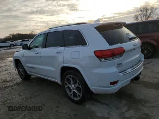 2020 Jeep Grand Cherokee High Altitude with VIN 1C4RJFCG1LC101888, listed as a Copart auction lot 87733565 with 64,240 mi miles and Salvage title. Bid and sale history available at DreamBid. Image 2.