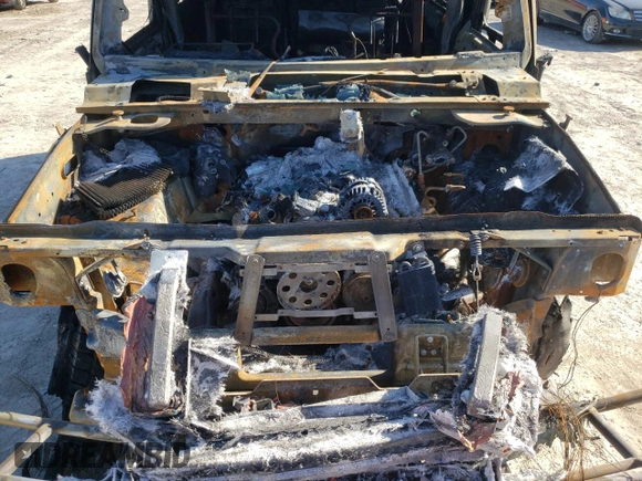 2003 Hummer H2 z VIN 5GRGN23U43H103551, wystawiony jako Copart lot #45456775 z przebiegiem Nie podano mil oraz Nie do naprawy. Historia ofert i sprzedaży dostępna na DreamBid. Obrazek 13.