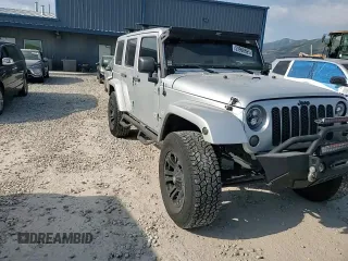 2012 Jeep Wrangler Unlimited Sahara z VIN 1C4HJWEG4CL159731, wystawiony jako Copart lot #59968695 z przebiegiem 111 918 mil mil oraz Szkoda całkowita • Salvage title. Historia ofert i sprzedaży dostępna na DreamBid. Obrazek 13.