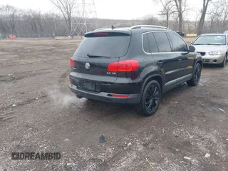 2012 Volkswagen Tiguan SE with VIN WVGAV7AX0CW602713, listed as a IAAI auction lot 41558520 with 95,678 mi miles and . Bid and sale history available at DreamBid. Image 4.