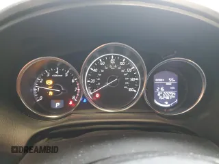 2016 Mazda CX-5 Sport z VIN JM3KE4BY0G0628372, wystawiony jako Copart lot #57534785 z przebiegiem 152 487 mil mil oraz Szkoda całkowita • Salvage title. Historia ofert i sprzedaży dostępna na DreamBid. Obrazek 9.