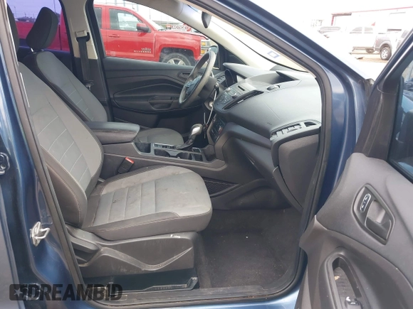 2018 Ford Escape S with VIN 1FMCU0F77JUA91134, listed as a IAAI auction lot 42095708 with 104,430 mi miles and . Bid and sale history available at DreamBid. Image 5.