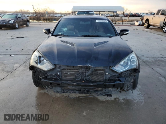 2013 Hyundai Genesis Coupe Track z VIN KMHHU6KJ1DU095159, wystawiony jako Copart lot #88560805 z przebiegiem 168 290 mil mil oraz Szkoda całkowita • Salvage title. Historia ofert i sprzedaży dostępna na DreamBid. Obrazek 5.
