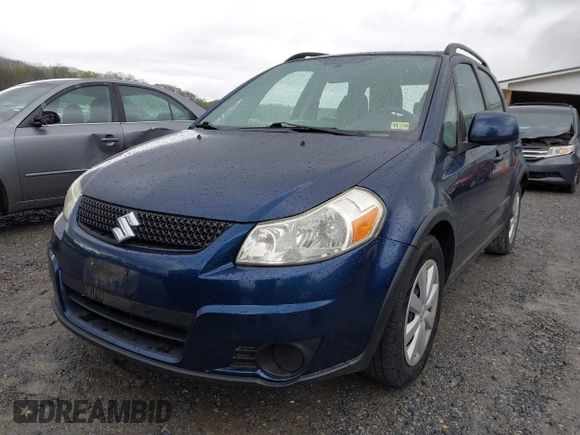 2011 Suzuki SX4 Crossover with VIN JS2YB5A31B6304110, listed as a IAAI auction lot 42023959 with 127,730 mi miles. Bid and sale history available at carsss.com. Image 6.