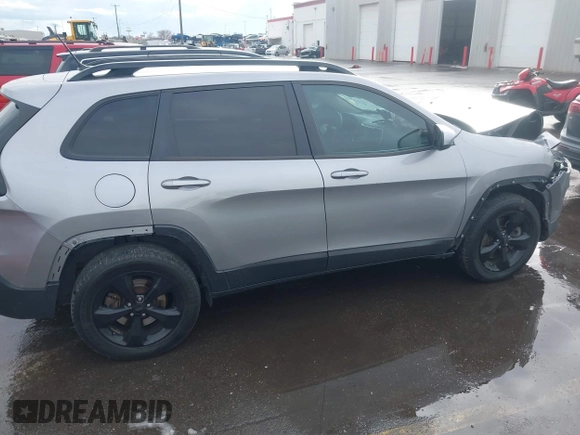 2018 Jeep Cherokee Latitude with VIN 1C4PJMCX4JD548136, listed as a IAAI auction lot 41592821 with 165,022 mi miles and . Bid and sale history available at DreamBid. Image 13.