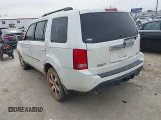 2013 Honda Pilot Touring with VIN 5FNYF3H98DB025516, listed as a IAAI auction lot 41767097 with 202,908 mi miles and . Bid and sale history available at DreamBid. Image 3.