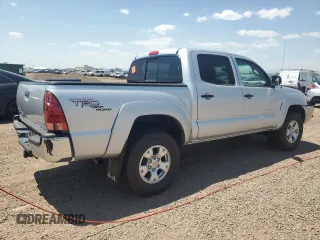 2006 Toyota Tacoma with VIN 5TELU42N76Z283409, listed as a Copart auction lot 61391785 with 77,799 mi miles and Salvage title. Bid and sale history available at DreamBid. Image 3.
