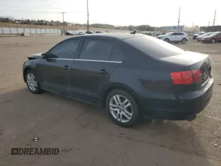 2014 Volkswagen Jetta TDI w/Premium with VIN 3VW3L7AJ7EM412700, listed as a Copart auction lot 82004544 with 157,399 mi miles and Salvage title. Bid and sale history available at DreamBid. Image 2.