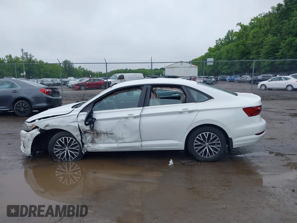 2021 Volkswagen Jetta S z VIN 3VWC57BU9MM103778, wystawiony jako IAAI lot #42493041 z przebiegiem 74 723 mil mil oraz . Historia ofert i sprzedaży dostępna na DreamBid. Obrazek 14.