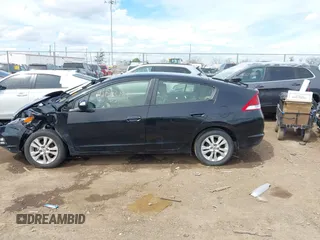 2014 Honda Insight EX z VIN JHMZE2H75ES001709, wystawiony jako IAAI lot #42086181 z przebiegiem 103 045 mil mil oraz . Historia ofert i sprzedaży dostępna na DreamBid. Obrazek 14.